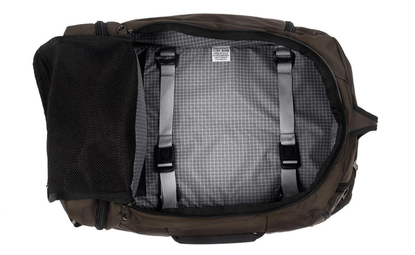 An open Techonaut 30 with a Ursa (brown) exterior and a Northwest Sky (grey) interior.